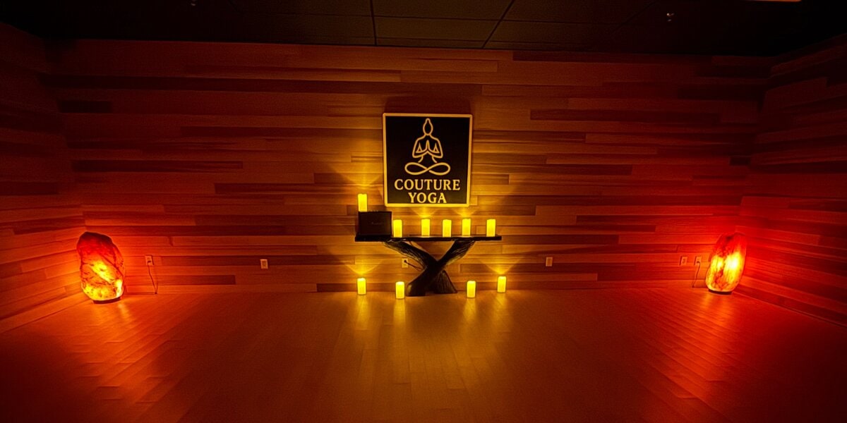Meditation room at Couture Yoga Institute illuminated by candles and Himalayan salt lamps.